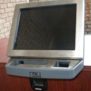 Wall mounted biometric and scanning terminal.